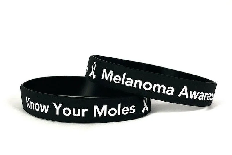 Know Your Moles - Melanoma Awareness black wristband white letters -  Adult 8"