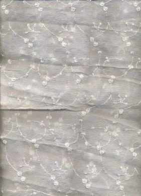 White silk chiffon fabric 44&quot; wide embroidered with white matching flowers